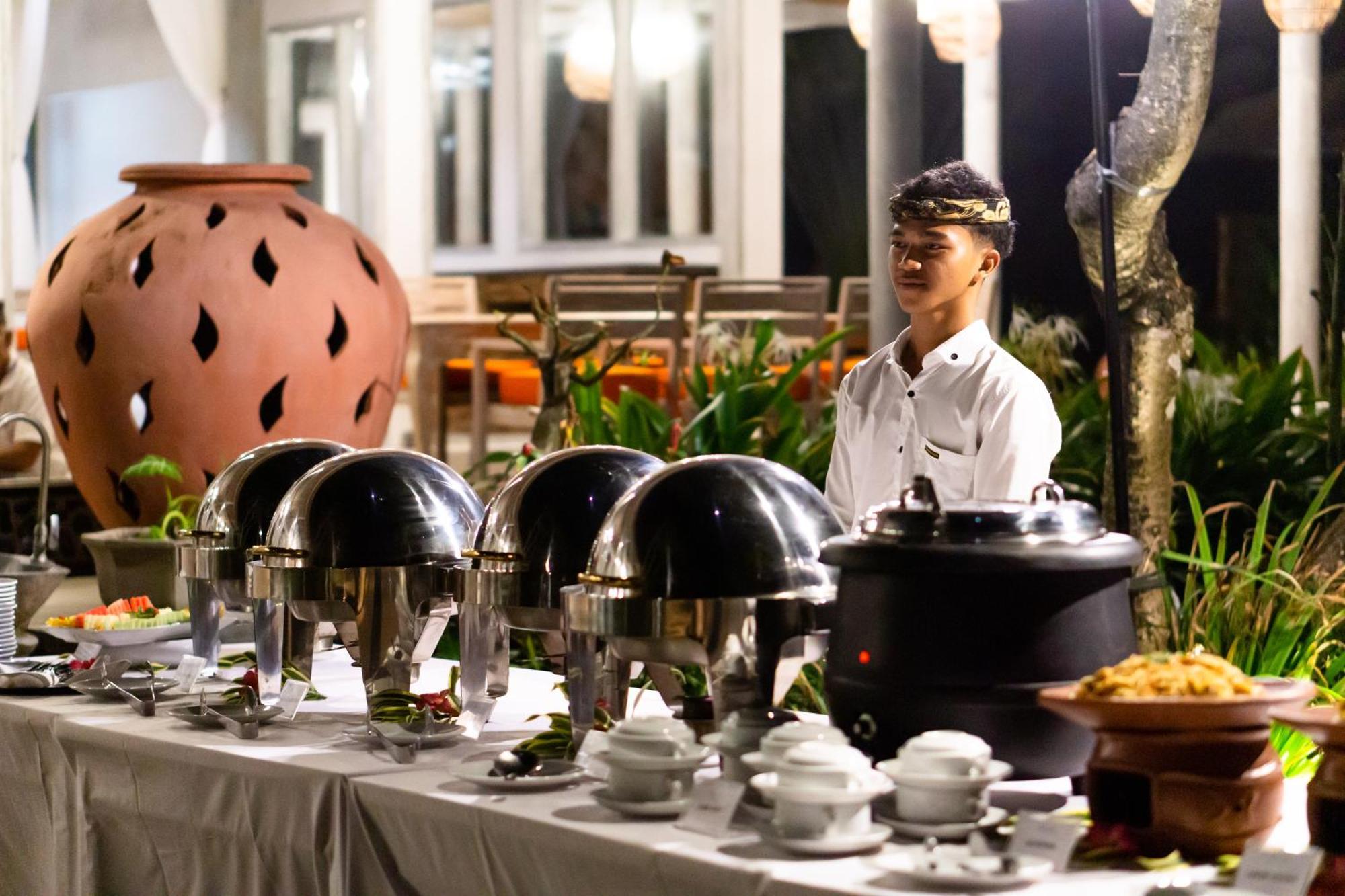 Nirwana Beach & Resort Кандидаса Экстерьер фото A buffet at a hotel